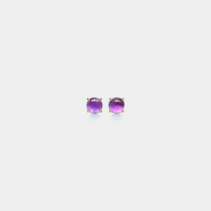 Pair of round purple gemstone earrings on a white background
