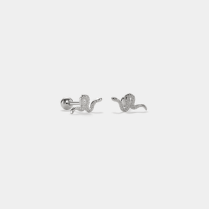 A pair of screw back crawler earrings designed to resemble a snake, with a white gold plating on sterling silver, displayed against a white background.