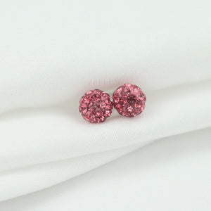 A pair of Shambala stud earrings with silver hypoallergenic posts and spherical cubic zirconia embellishments.