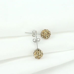 A pair of Shambala stud earrings with silver hypoallergenic posts and spherical cubic zirconia embellishments.