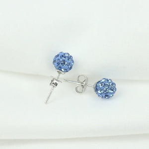 A pair of Shambala stud earrings with silver hypoallergenic posts and spherical cubic zirconia embellishments.