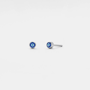 A pair of small, round, blue Turkish evil eye stud earrings with gold plating on a white background.