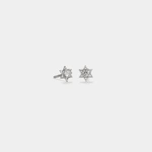 A pair of small gold-colored Star of David stud earrings with cubic zirconia inlays, displayed against a white background.