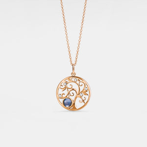 A gold-plated necklace with a sterling silver Tree of Life pendant and a blue cubic zirconia at the center, displayed on a white background.