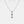 A silver necklace with gold plating featuring three round crystal glass pendants in a gradient of colors, suspended from a gold-plated chain.