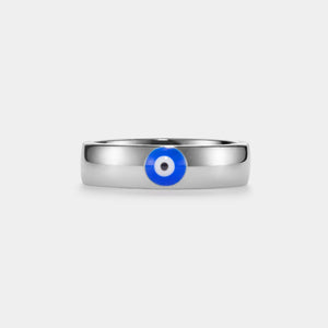 Silver ring with a blue evil eye on a white background