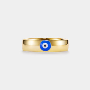 Gold ring with a blue evil eye on a white background
