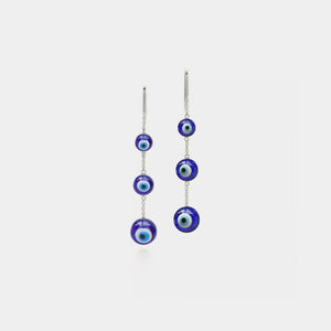 A pair of Turkish Evil Eye bead dangle drop earrings with gold plating and hypoallergenic finish.