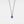A Turkish evil eye necklace with a blue enamel charm on a black rope chain.