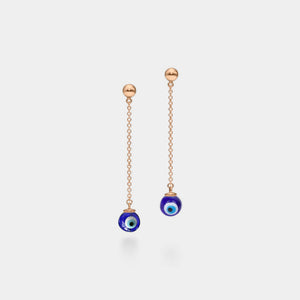 A pair of gold-plated sterling silver drop earrings with blue evil eye pendants.