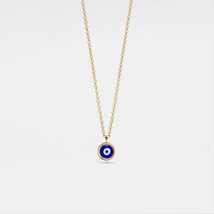 Gold necklace with a blue evil eye pendant on a light gray background
