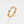 Gold evil eye ring with blue gemstones and diamond accents on a white background