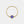 Gold chain ring with a blue evil eye charm on a white background