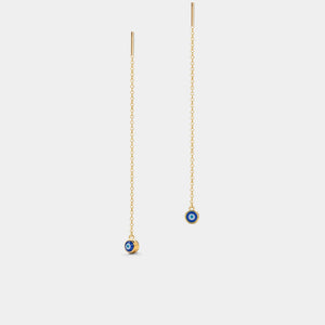 Gold chain earrings with small round charms on a light gray background