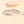 Two silver rings with gold sun and moon accents on a light beige background