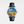 Watch with a Van Gogh painting design on the dial against a white background