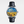 Watch with a Van Gogh painting design on the face against a white background