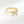 Gold butterfly ring with diamond accents on a white background