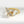 Gold spinner ring with diamond-encrusted butterfly design on a white background