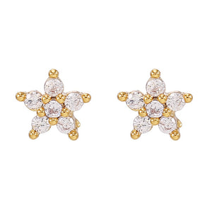 Gold stud earrings featuring a dainty flower design with clear stones, arranged in a six-petal cluster on a white background.