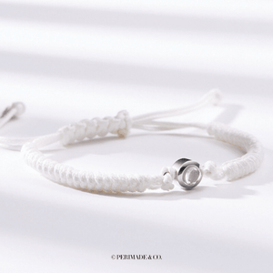 Three sterling silver rope chain bracelets with gold plating, adjustable closures, and colorful accents displayed on a flat surface.