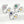 Three silver rings with colorful gemstones on a white background