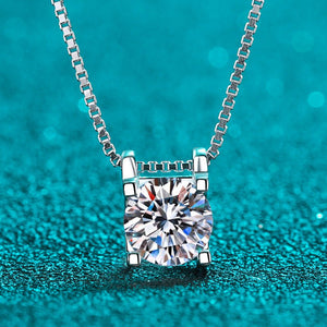 Diamond necklace on a teal background