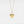 Gold heart-shaped locket necklace on a light gray background