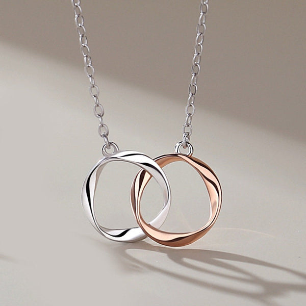 Interlocking Mobius Ring Couple Necklace