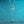 Silver necklace with a crescent moon and star pendant on a blue background