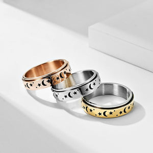 Three rings in rose gold, silver, and gold on a white background