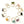 Gold rings with various colored gemstones on a white background