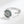 Silver spinner ring with saturn charm on a white background
