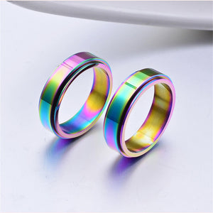 Two rainbow-colored rings on a white background