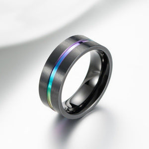 Silver ring with a colorful stripe on a white background
