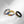 Three rings with rainbow stripes on a white background