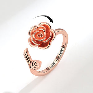 Rose gold rose-shaped bracelet with 'I Love You Forever' engraving on a white background