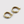 A set of two small hoop earrings with gold plating, displayed against a white background.