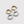 A set of four small hoop earrings, two with gold plating and two with white gold plating, displayed against a white background.