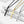 Three cross necklaces in black, gold, and silver on a white surface