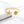 Gold ring with starfish and shell designs on a white background.