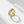 Gold celestial engraved ring with sun, moon, and stars design on a wide band