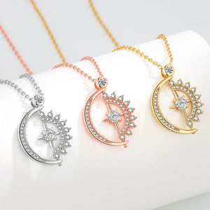 Three moon and star pendants in silver, rose gold, and gold on a white background