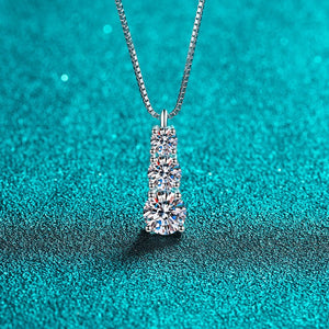Diamond necklace on a teal textured background